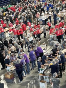 Aerial photo of CareSource volunteers in a large crowd at the Atlanta Mean Pack event